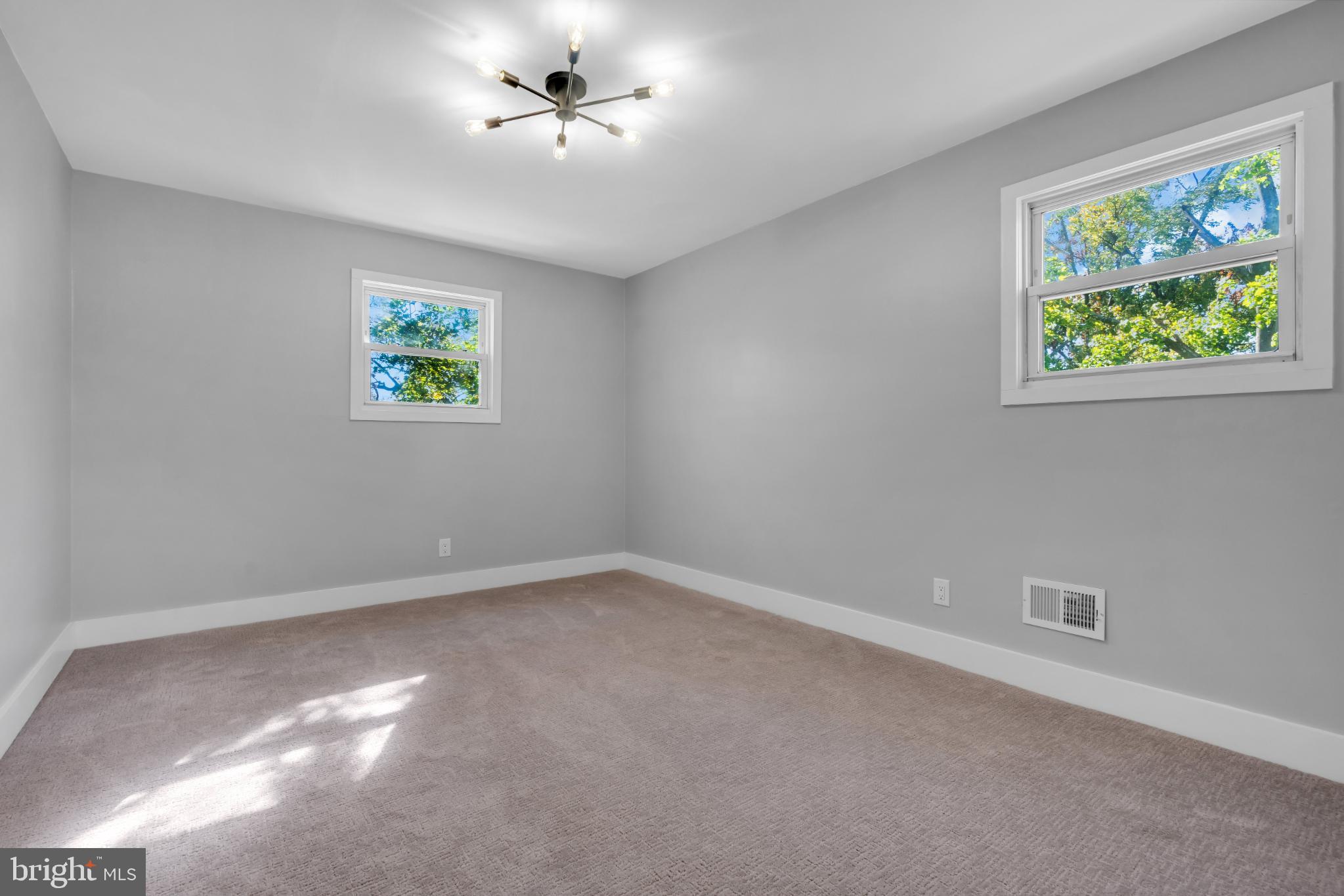 104 East Laurelton Avenue Maple Shade, NJ 08052 - Photo 15 of 37 an empty room with a window