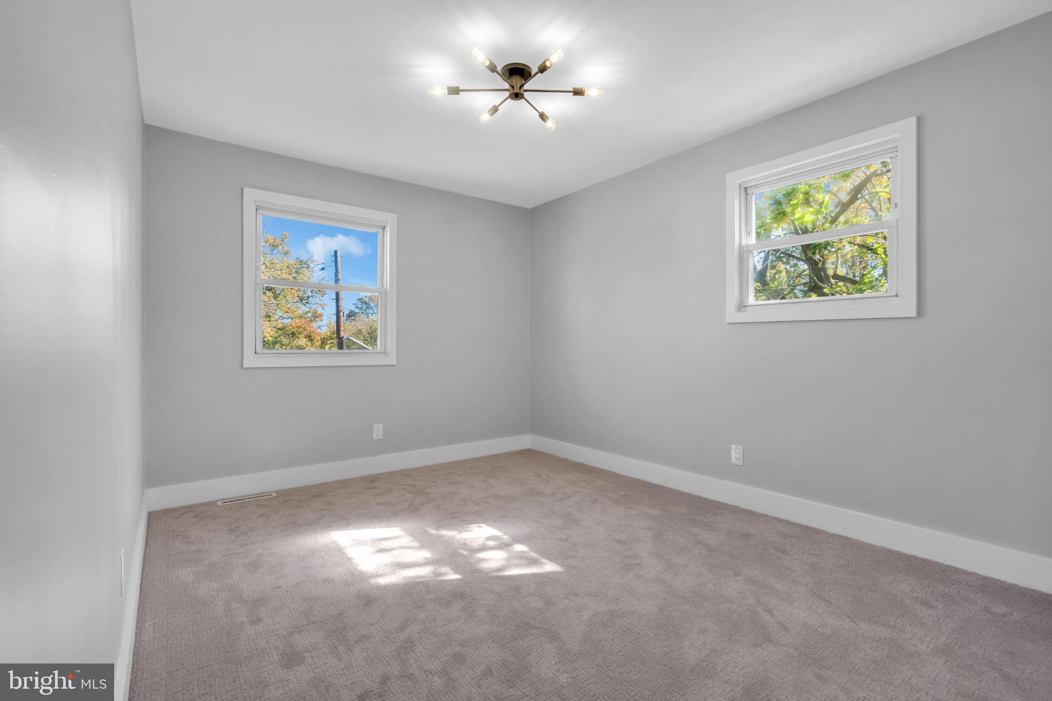 104 East Laurelton Avenue Maple Shade, NJ 08052 - Photo 20 of 37 a view of room with window and ceiling fan