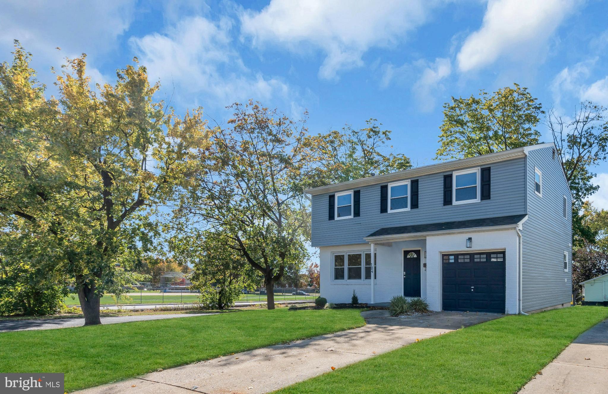 104 East Laurelton Avenue Maple Shade, NJ 08052 - Photo 2 of 37 a front view of a house with a garden