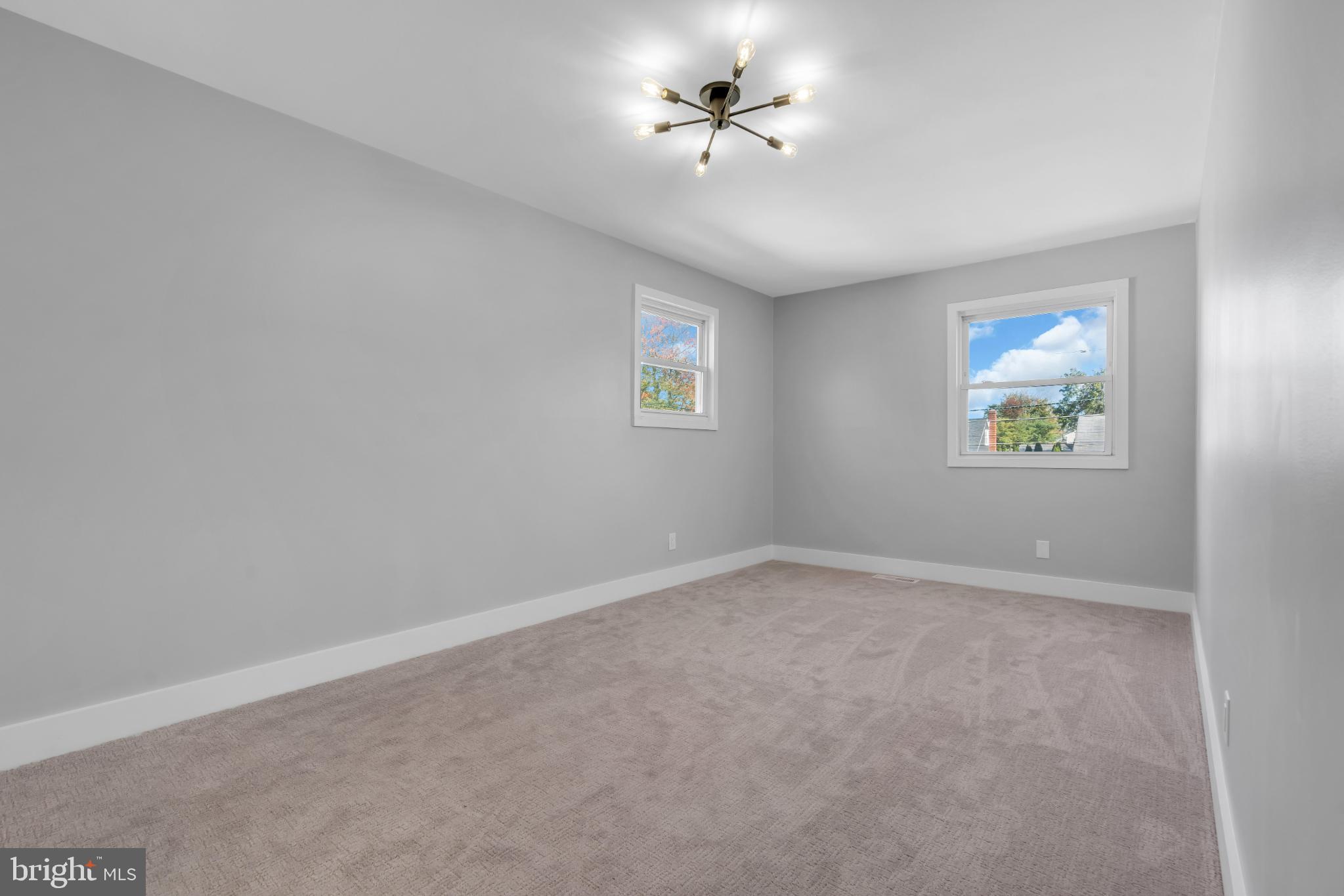 104 East Laurelton Avenue Maple Shade, NJ 08052 - Photo 21 of 37 a view of room with a ceiling fan and window