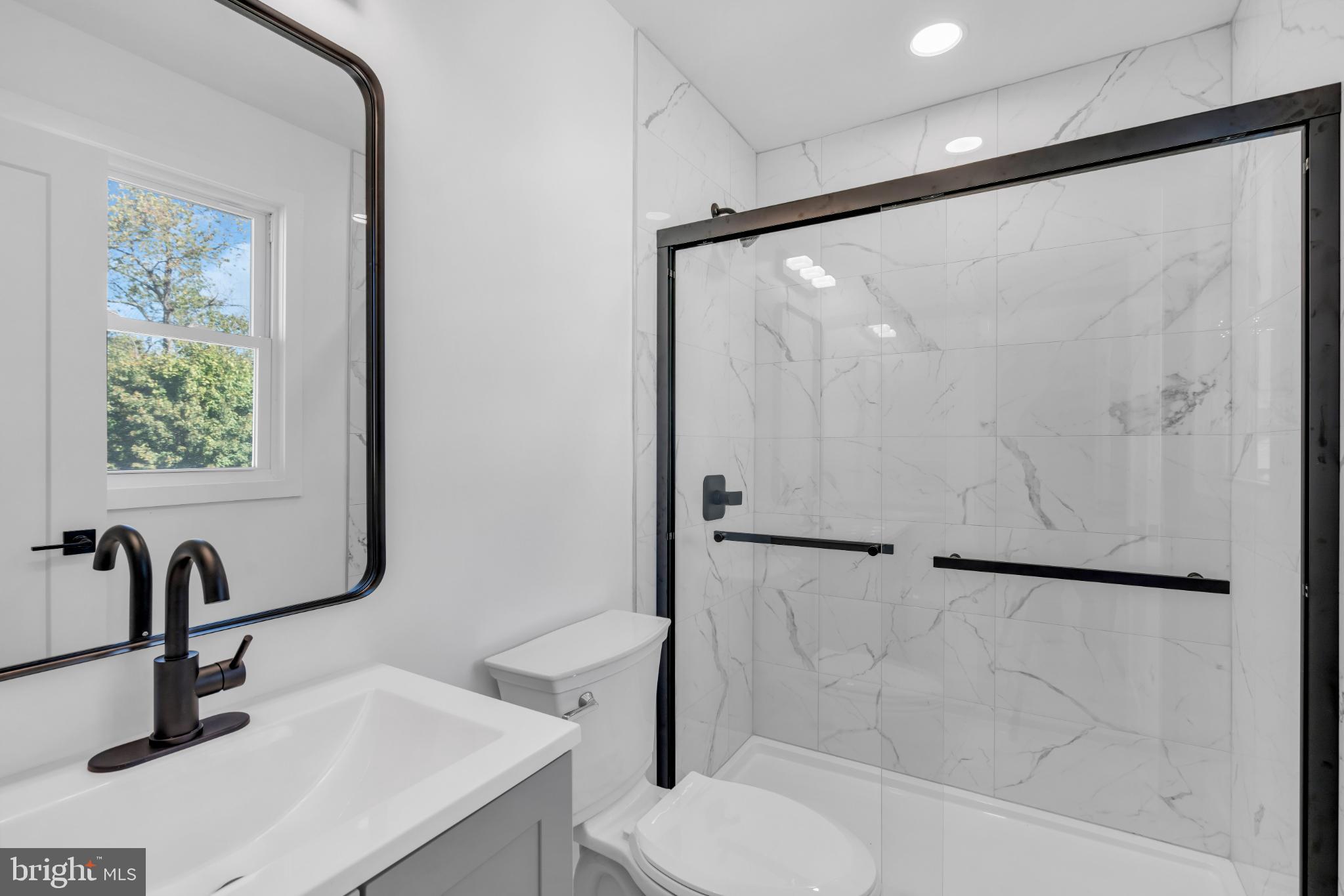 104 East Laurelton Avenue Maple Shade, NJ 08052 - Photo 22 of 37 a bathroom with a sink toilet and shower