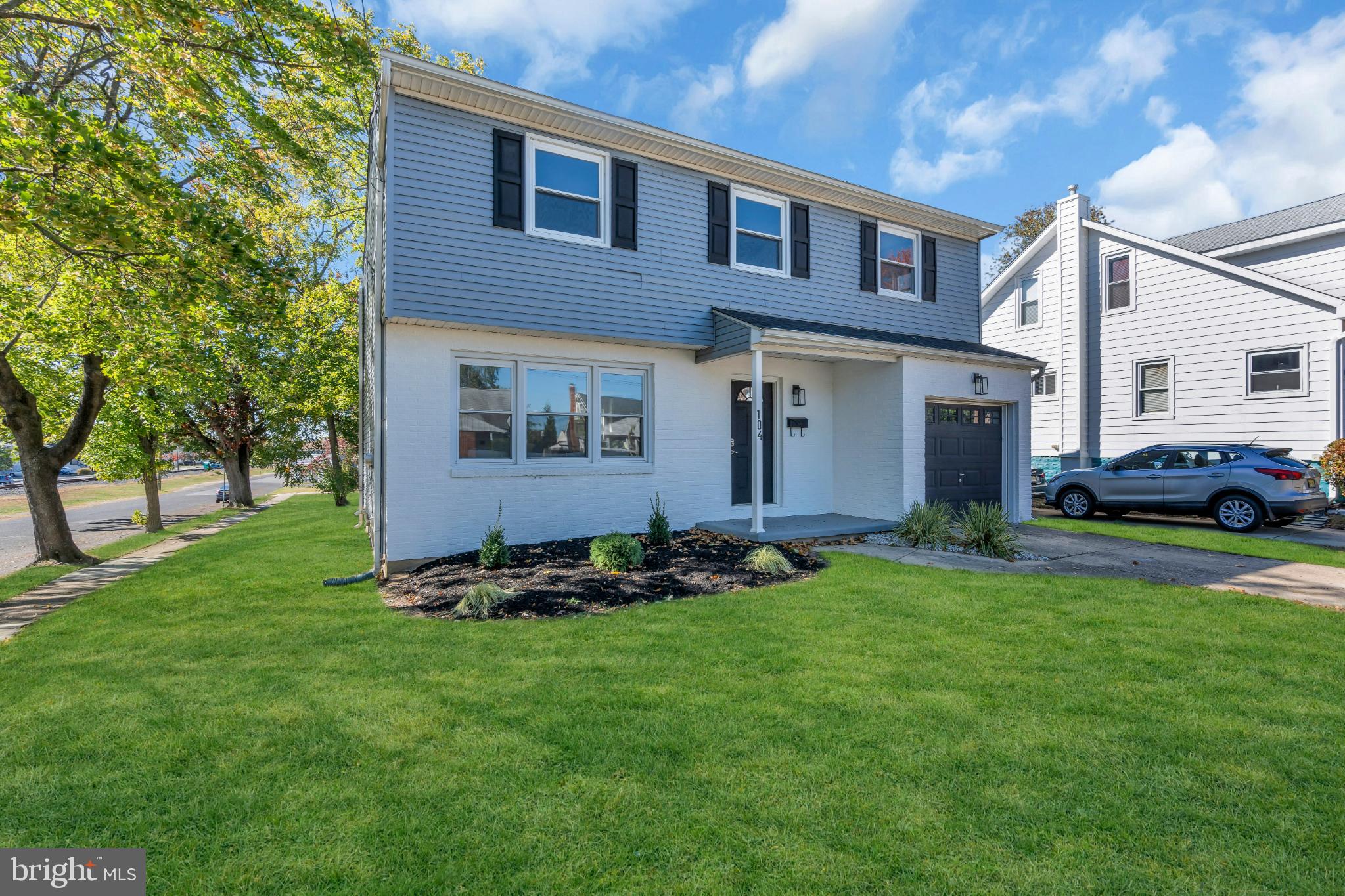 104 East Laurelton Avenue Maple Shade, NJ 08052 - Photo 35 of 37 a front view of a house with a yard
