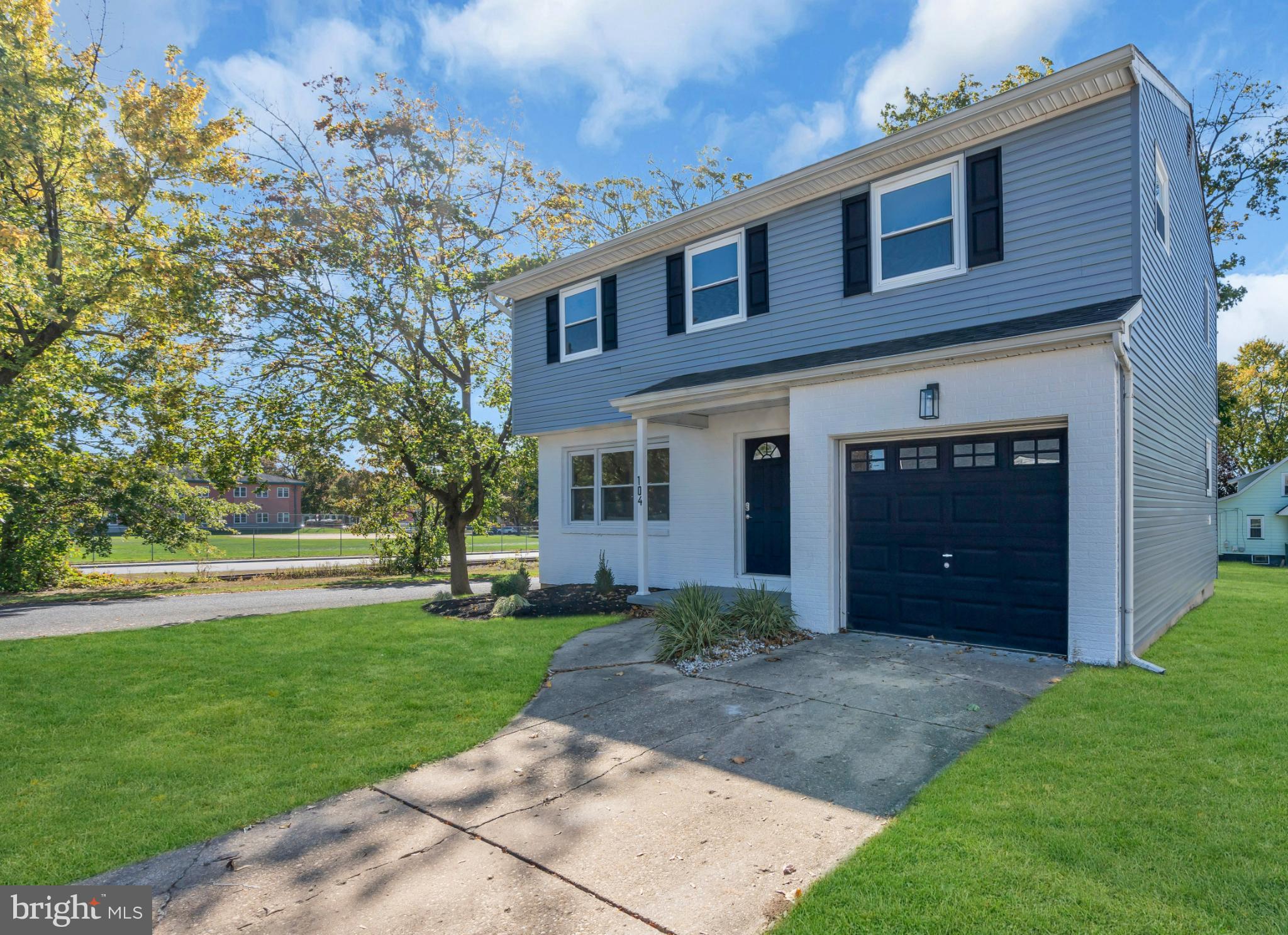 104 East Laurelton Avenue Maple Shade, NJ 08052 - Photo 36 of 37 a front view of a house with garden