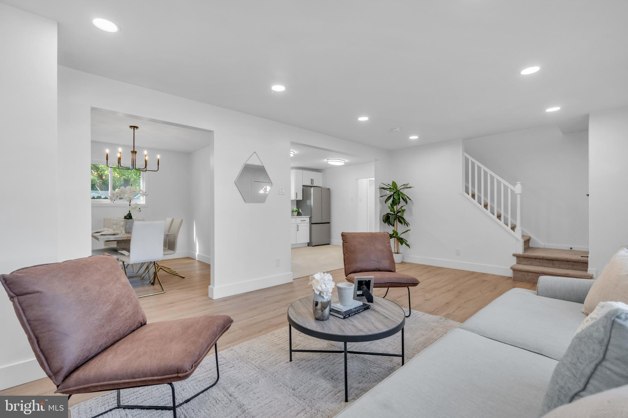 104 East Laurelton Avenue Maple Shade, NJ 08052 - Photo 4 of 37 a living room with furniture and a wooden floor