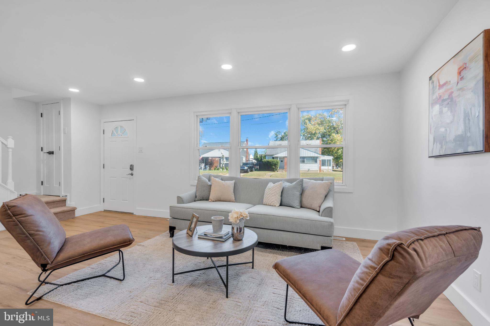 104 East Laurelton Avenue Maple Shade, NJ 08052 - Photo 5 of 37 a living room with furniture and a large window
