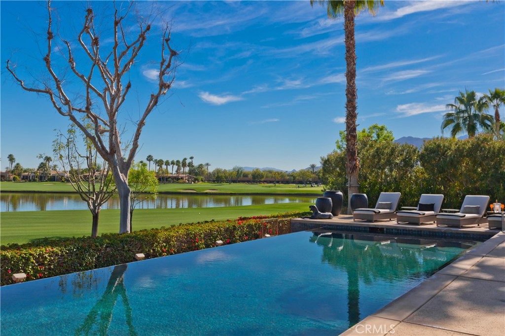 57780 Troon Way La Quinta, CA 92253 - Photo 13 of 67 a view of a house with a yard and a fountain