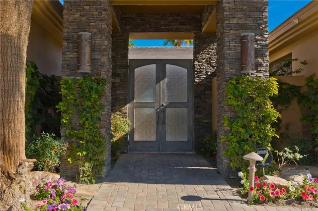 a dining room with furniture a window and kitchen view