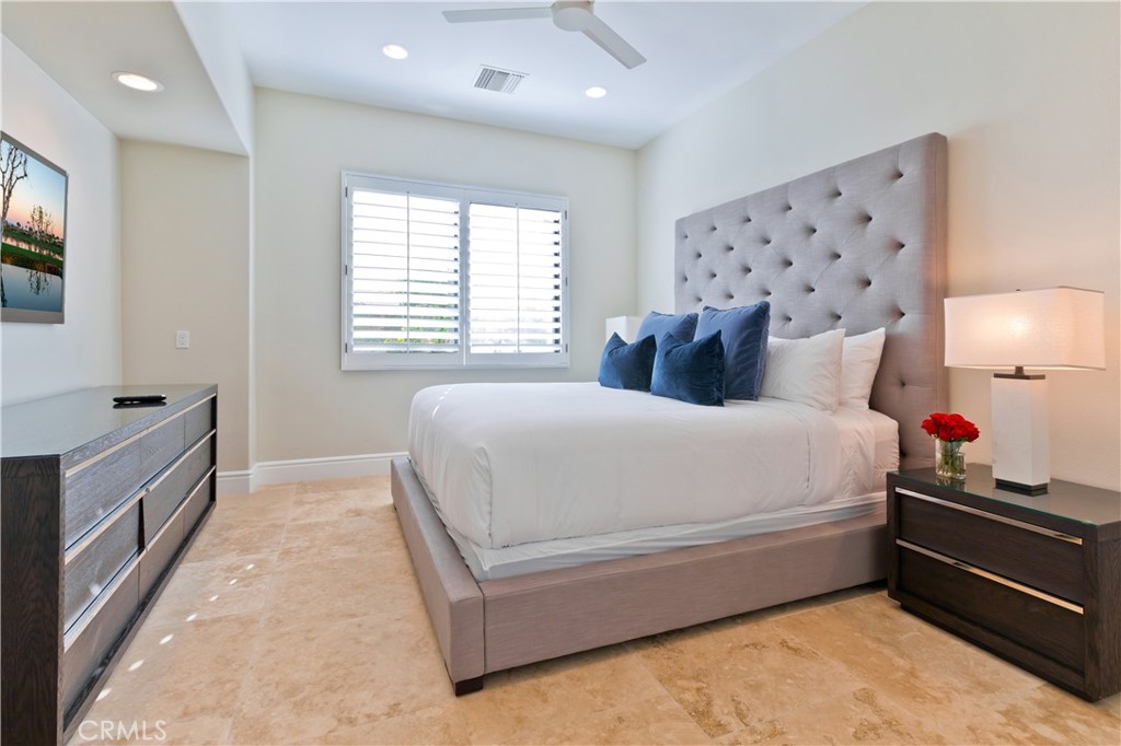 57780 Troon Way La Quinta, CA 92253 - Photo 37 of 67 a bedroom with bed and window