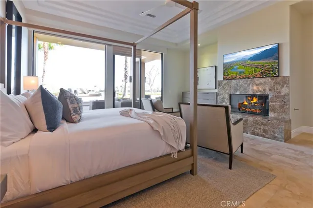 a large white bed in a white room