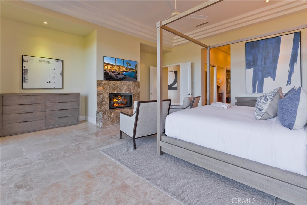 57780 Troon Way La Quinta, CA 92253 - Photo 43 of 67 a bedroom with a bed and furniture