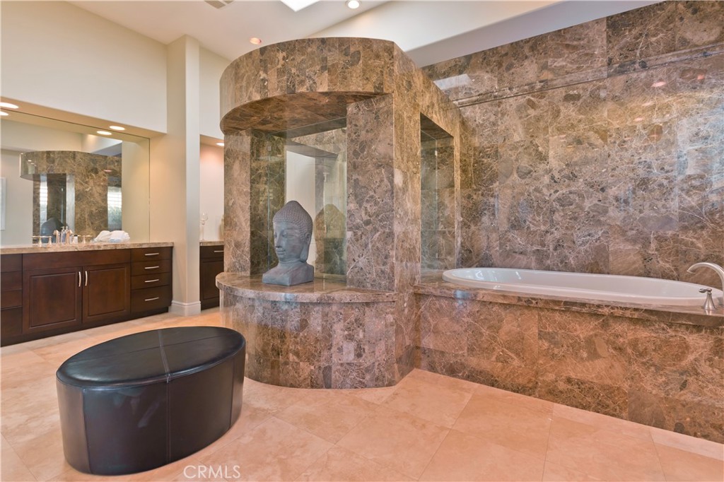 57780 Troon Way La Quinta, CA 92253 - Photo 48 of 67 a living room with furniture and a fireplace