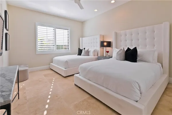 a view of a lake with palm trees