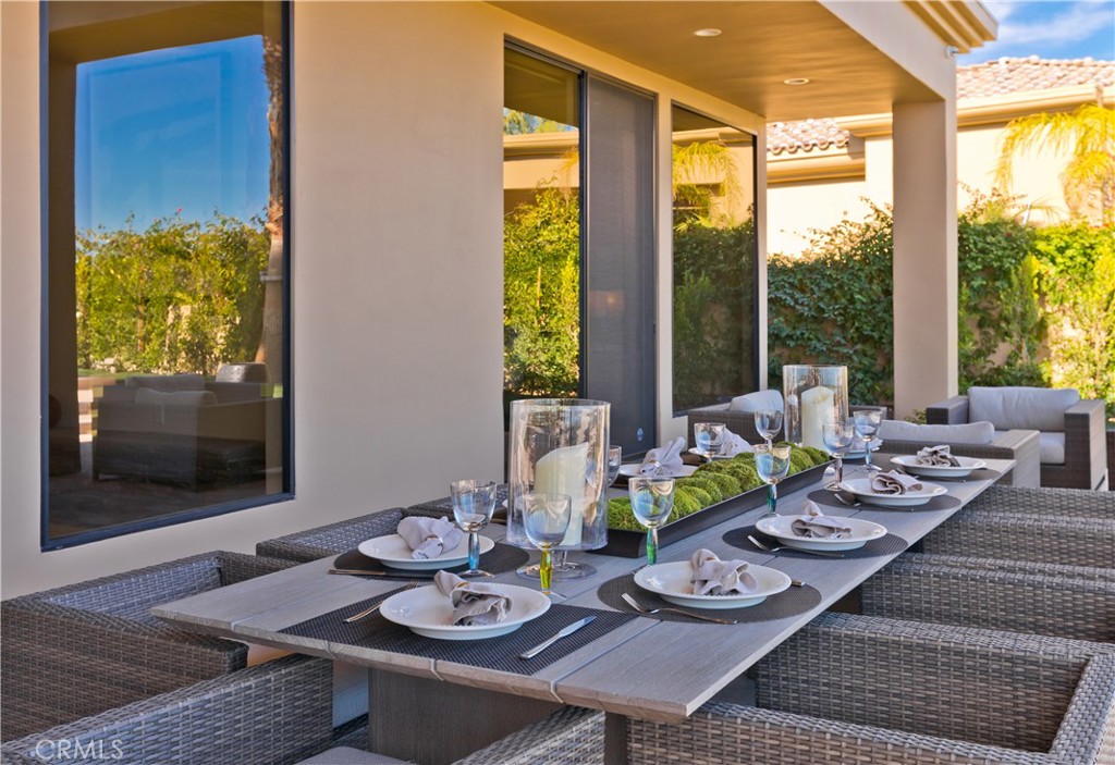 57780 Troon Way La Quinta, CA 92253 - Photo 5 of 67 a view of a dining room with furniture window and outside view