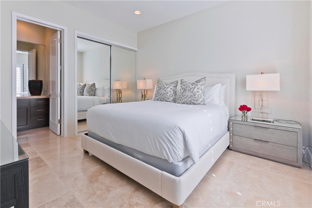 57780 Troon Way La Quinta, CA 92253 - Photo 58 of 67 a large white bed in a white room