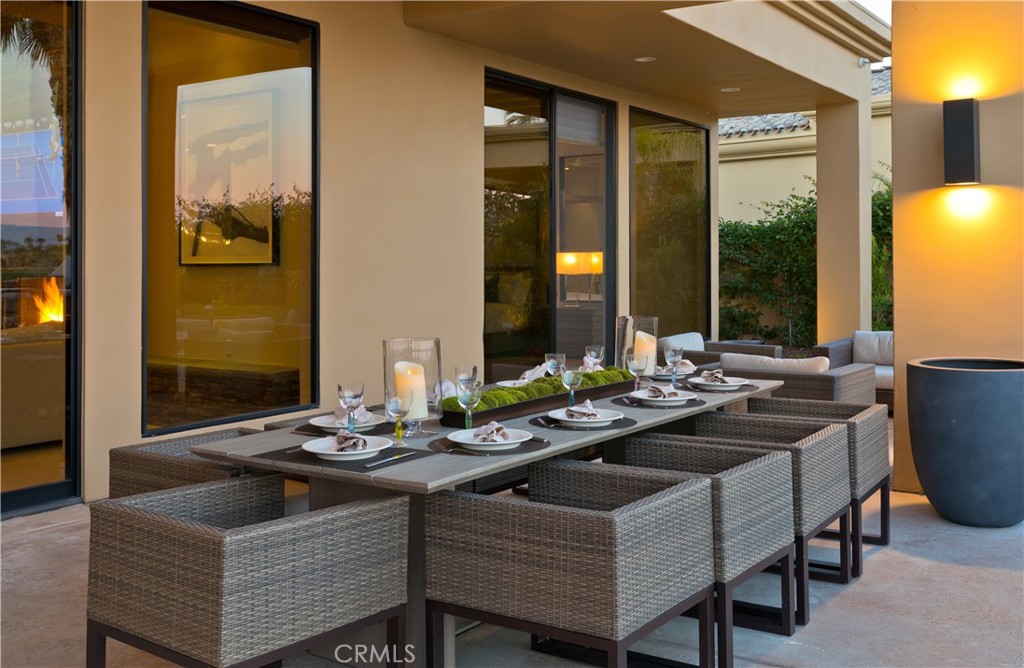 57780 Troon Way La Quinta, CA 92253 - Photo 62 of 67 a view of a dining room with furniture and chandelier