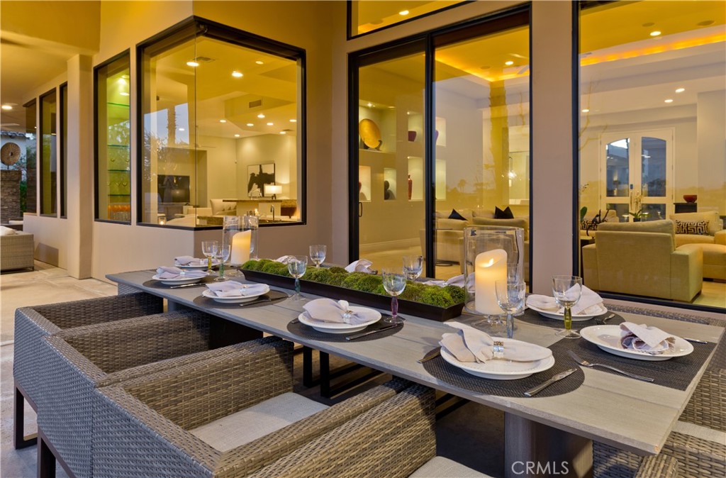 57780 Troon Way La Quinta, CA 92253 - Photo 65 of 67 a living room with furniture and a large window