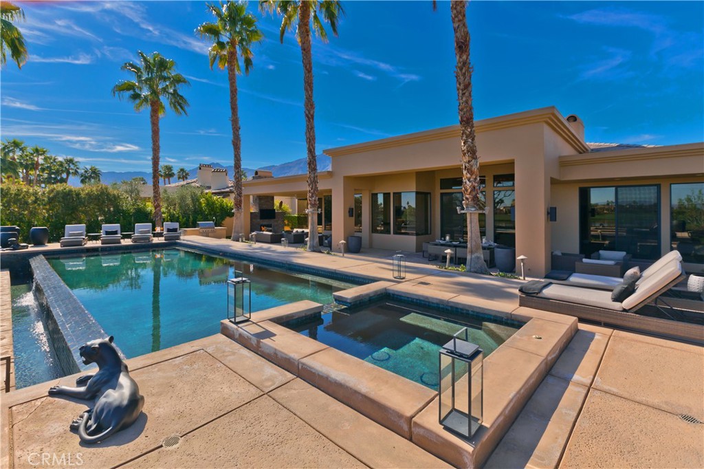 57780 Troon Way La Quinta, CA 92253 - Photo 7 of 67 a view of a swimming pool with chairs