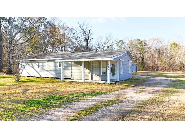 a view of a house with a swimming pool