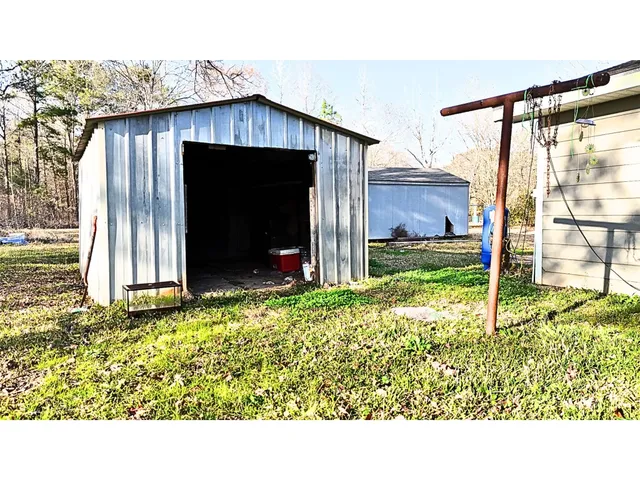 a black and white photo of a house