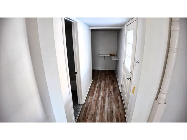 a open space with a sink and a mirror