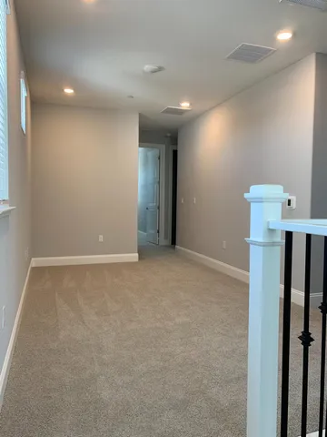 a view of a room with an empty space