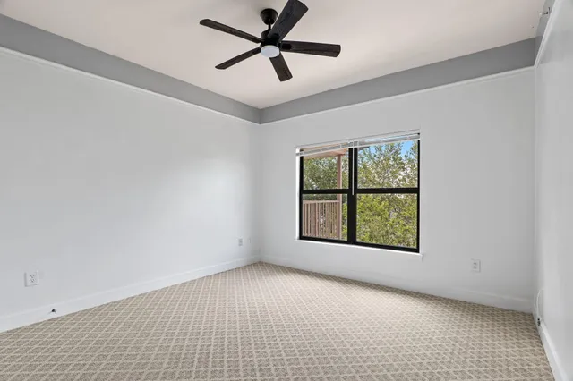 a view of a bathroom with a glass door