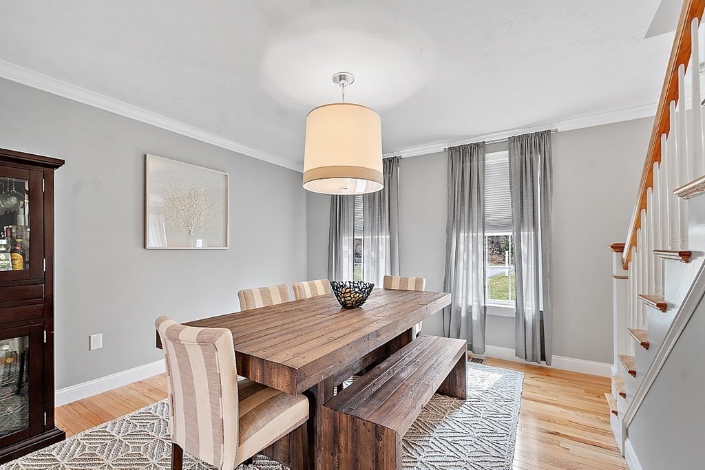 78 Hutchinson Road Sutton, MA 01590 - Photo 14 of 36 a view of a dining room with furniture and wooden floor