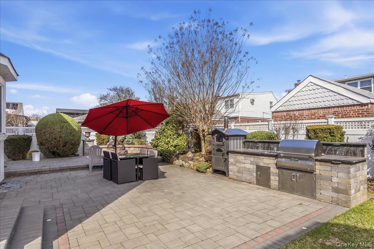 263 James Street Franklin Square, NY 11010 - Photo 22 of 23 a view of a patio with chairs and tables