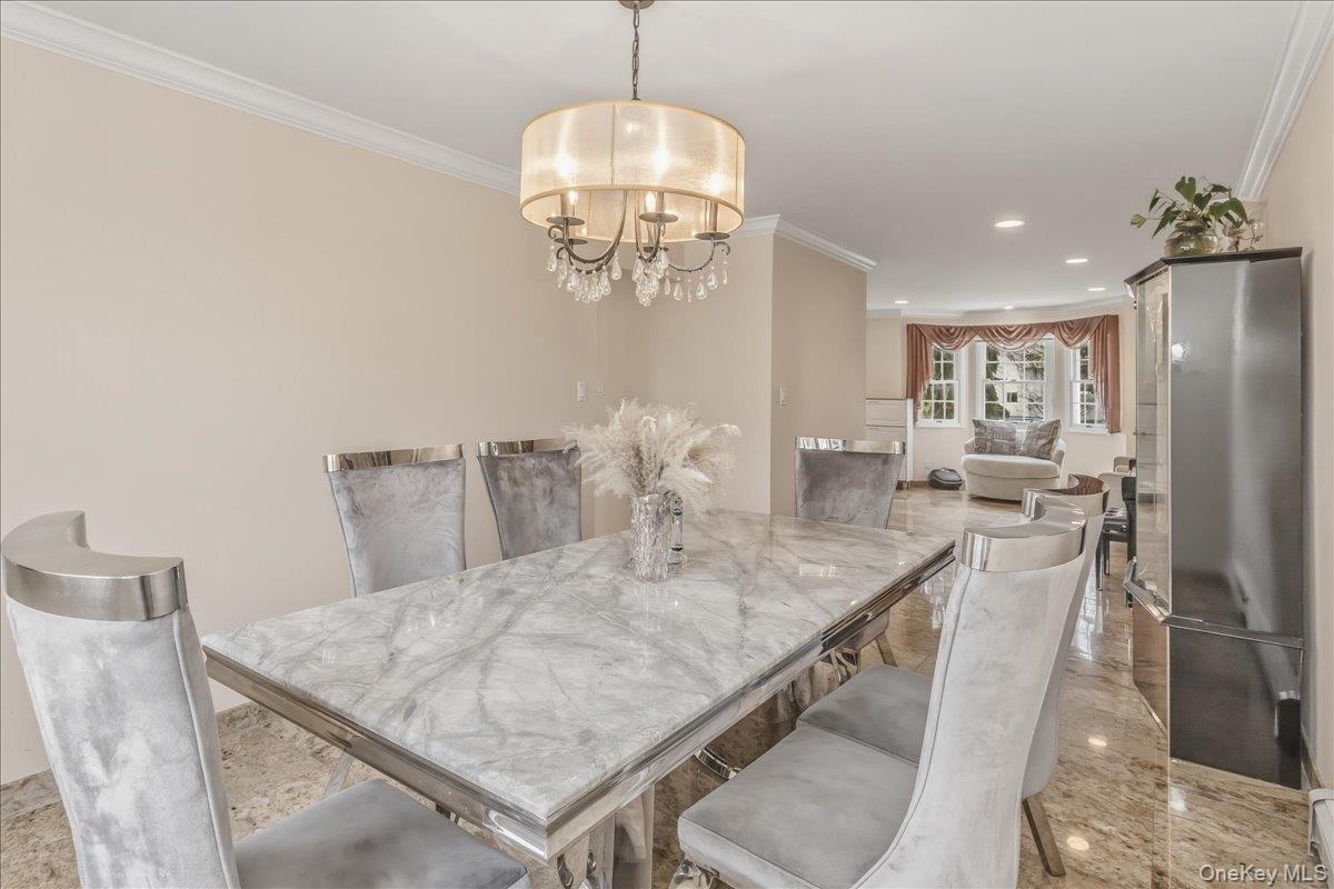 263 James Street Franklin Square, NY 11010 - Photo 3 of 23 a view of a dining room with furniture