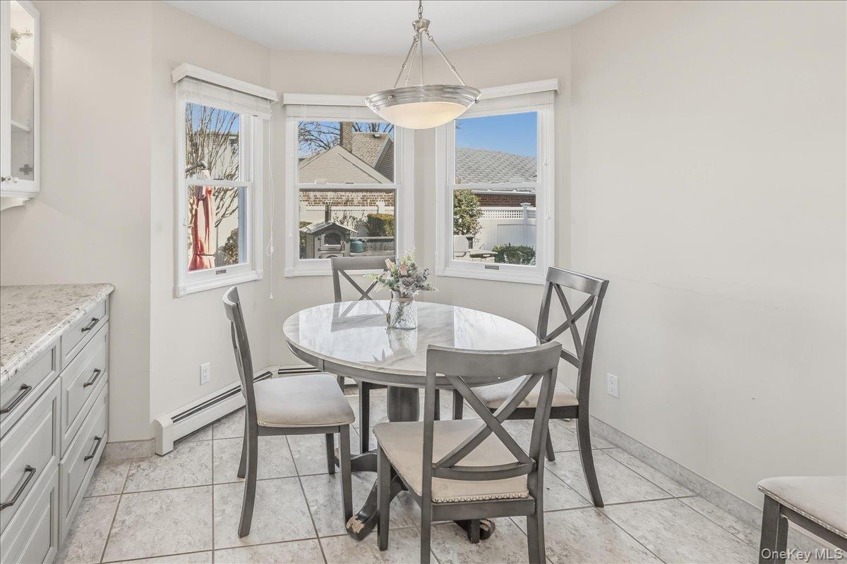 263 James Street Franklin Square, NY 11010 - Photo 7 of 23 a dining room with furniture and window