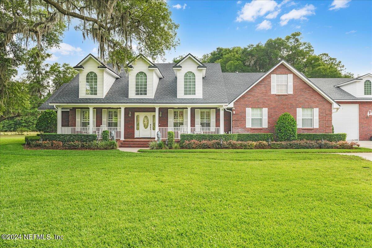 87359 Raddin Road Yulee, FL 32097 - Photo 1 of 80 Front of Home