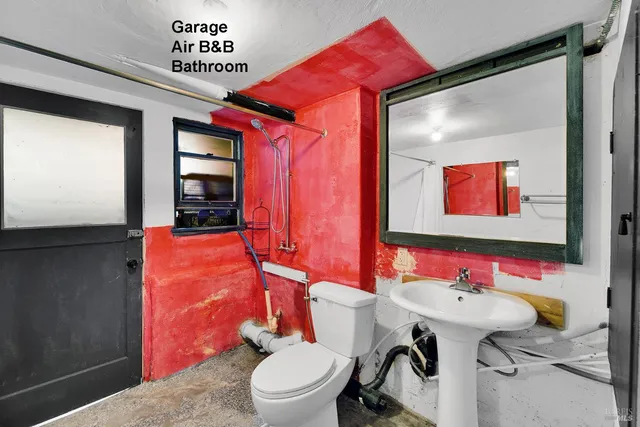 a view of house with yard and swimming pool