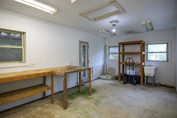 a backyard of a house with seating space