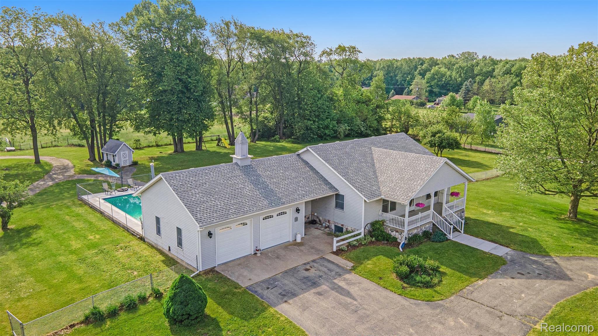 Amazing 5 bedroom ranch on almost 10 acres with an inground pool and pole barn