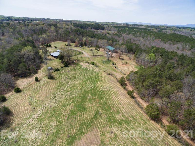 122 Hidden Springs Road Rutherfordton, NC 28139 - Photo 2 of 3 a view of a forest with trees in the background
