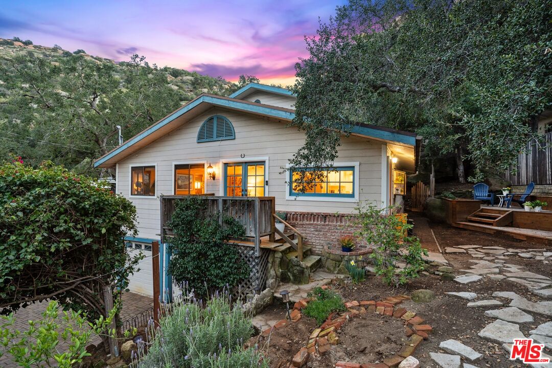 1083 Katherine Road Simi Valley, CA 93063 - Photo 1 of 72 a backyard of a house with yard and outdoor seating