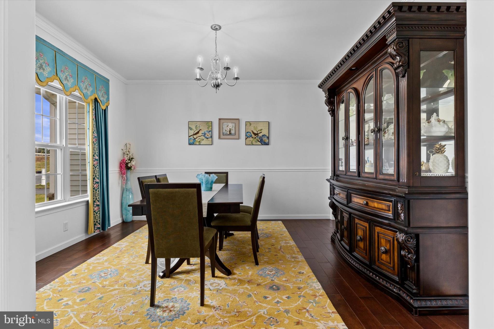 3 Rycroft Road Mechanicsburg, PA 17050 - Photo 16 of 55 a view of a dining room with furniture window and wooden floor