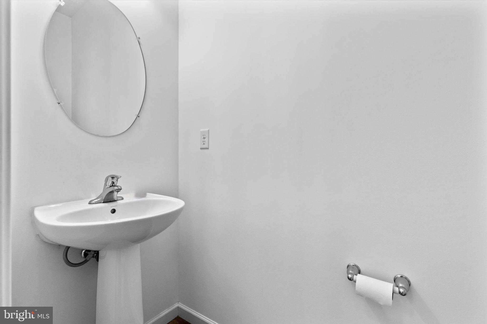 3 Rycroft Road Mechanicsburg, PA 17050 - Photo 19 of 55 a bathroom with a sink and a mirror