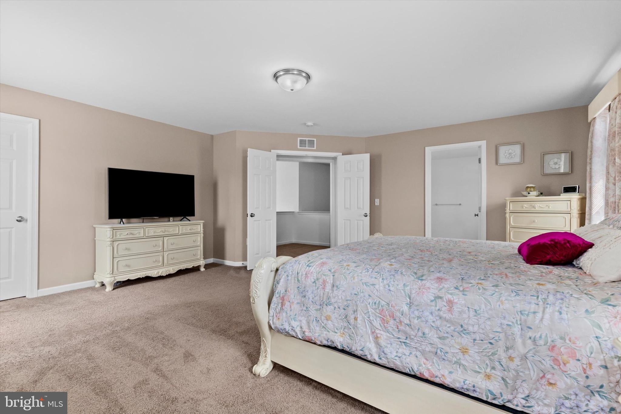 3 Rycroft Road Mechanicsburg, PA 17050 - Photo 23 of 55 a bedroom with a bed and flat screen tv