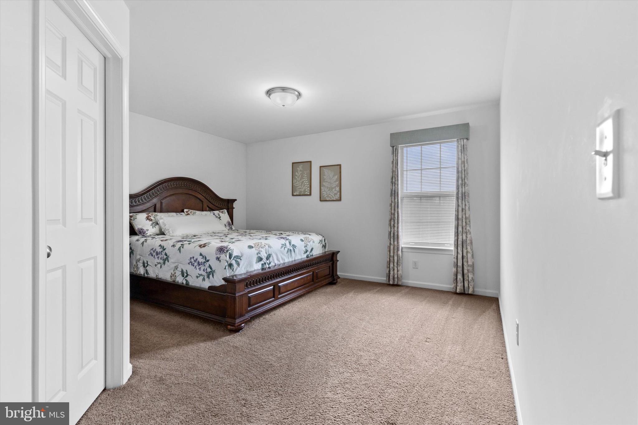 3 Rycroft Road Mechanicsburg, PA 17050 - Photo 32 of 55 a bedroom with a bed and a window