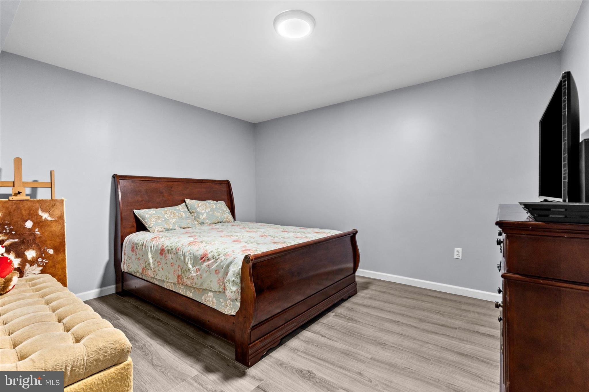 3 Rycroft Road Mechanicsburg, PA 17050 - Photo 41 of 55 a bedroom with a bed and a television