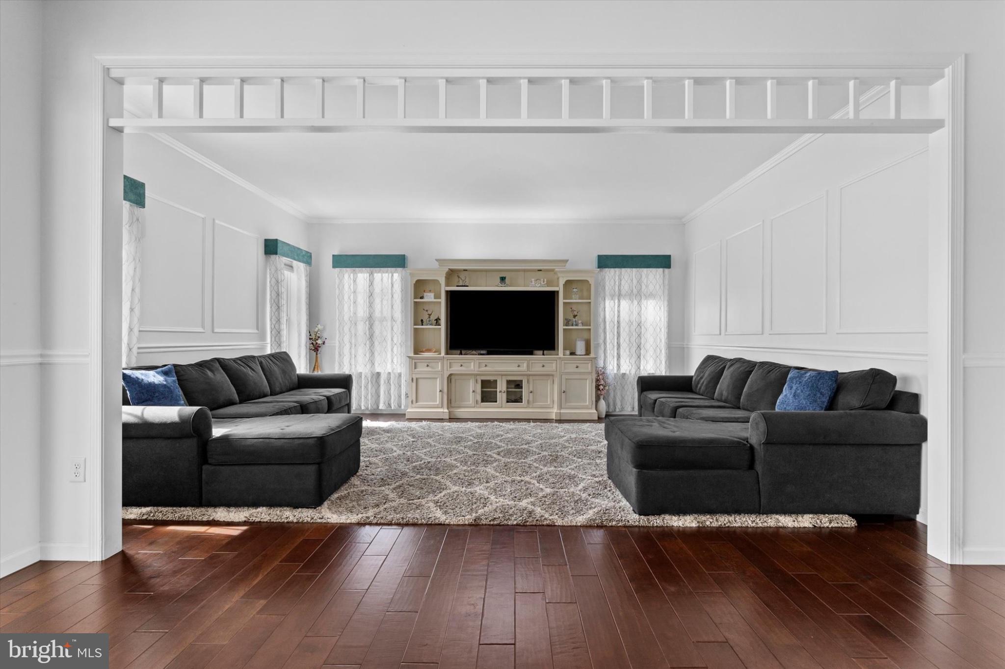 3 Rycroft Road Mechanicsburg, PA 17050 - Photo 7 of 55 a living room with furniture and a flat screen tv