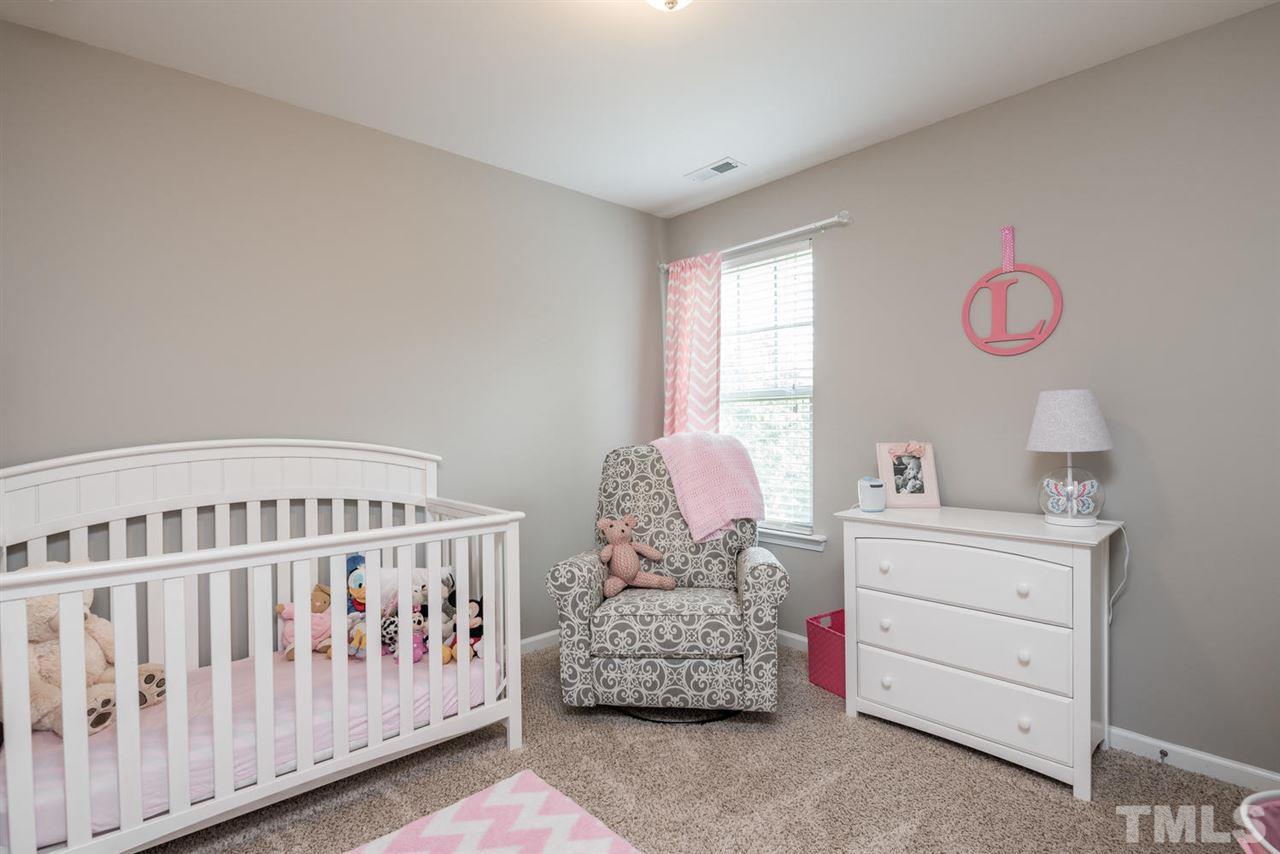 107 Holyoke Court Raleigh, NC 27603 - Photo 13 of 25 2nd Bedroom with walk in closet.