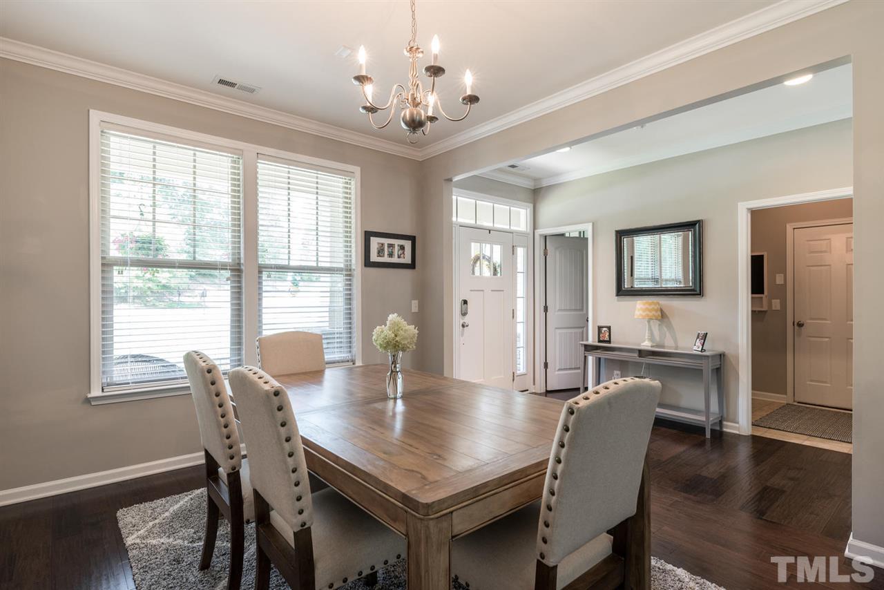 107 Holyoke Court Raleigh, NC 27603 - Photo 3 of 25 Gather for holiday meals or utilize this space for a home office or den. It's up to you!