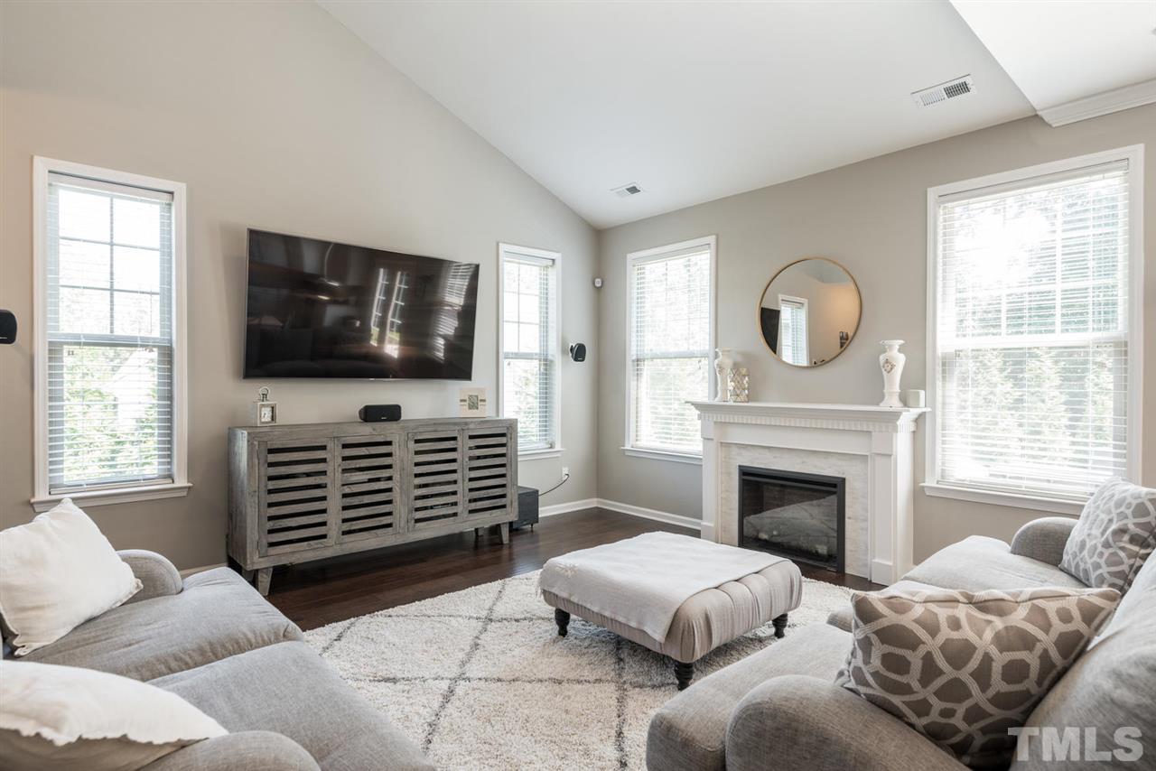 107 Holyoke Court Raleigh, NC 27603 - Photo 4 of 25 Put your feet up and get comfortable. Whether it's a quiet night in front of the fireplace or tv night with the family, you have plenty of room.