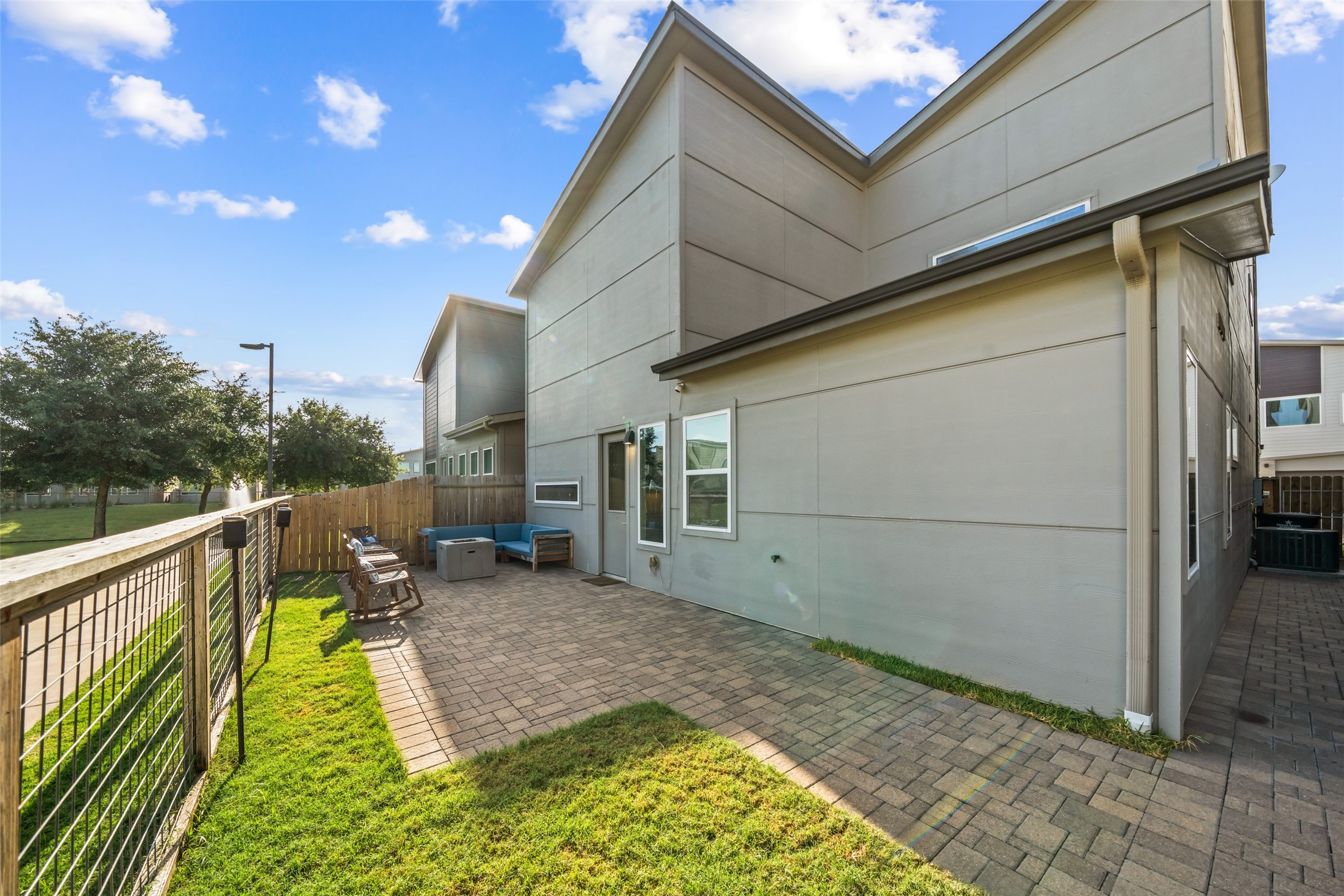 6809 Troya Lane Houston, TX 77092 - Photo 43 of 49 Even the side yard is fully bricked which is perfect for keeping things clean, low-maintenance, and mud-free year-round.