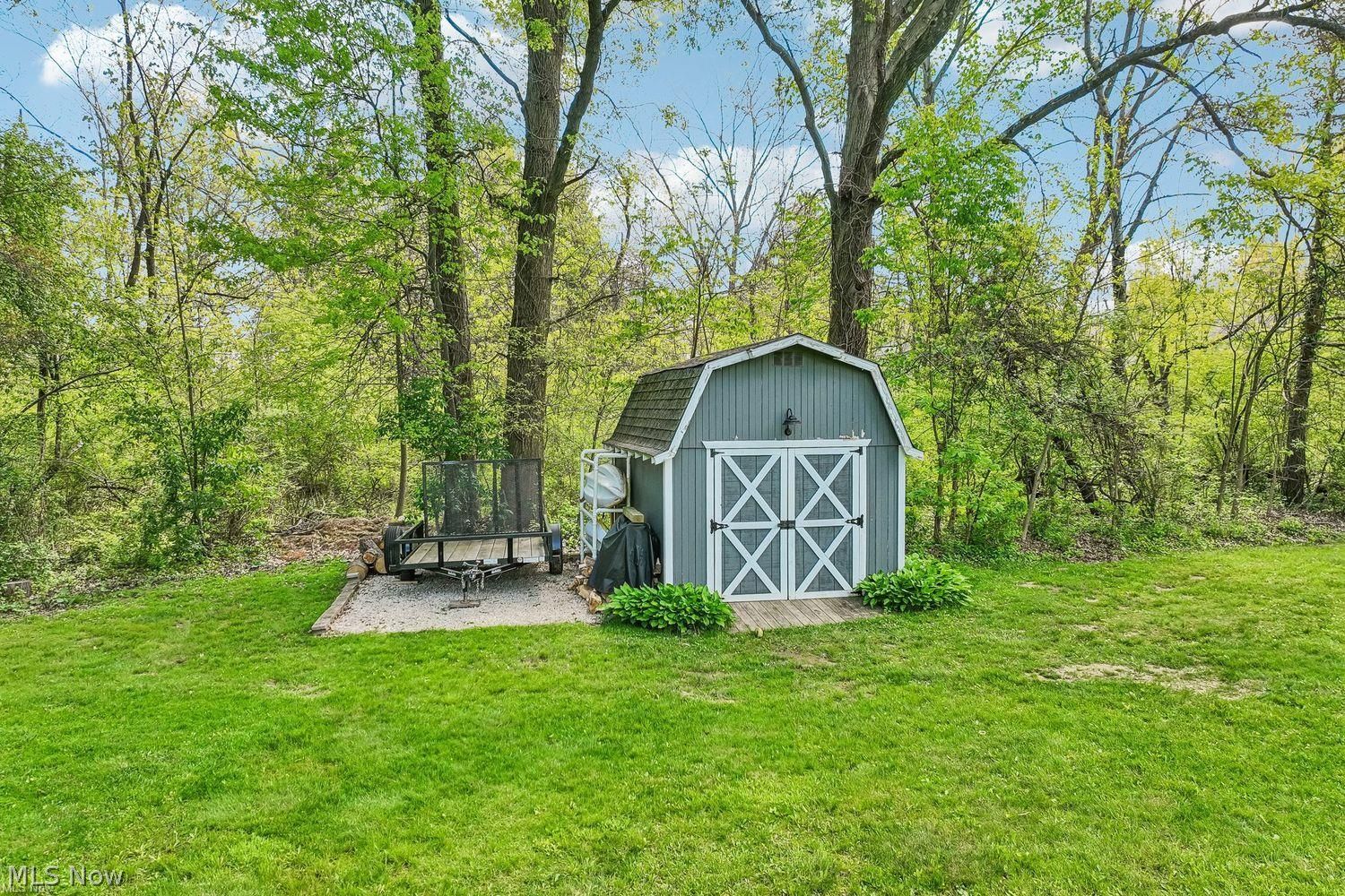 5113 West Bath Road Akron, OH 44333 - Photo 40 of 48 A well kept shed for storage