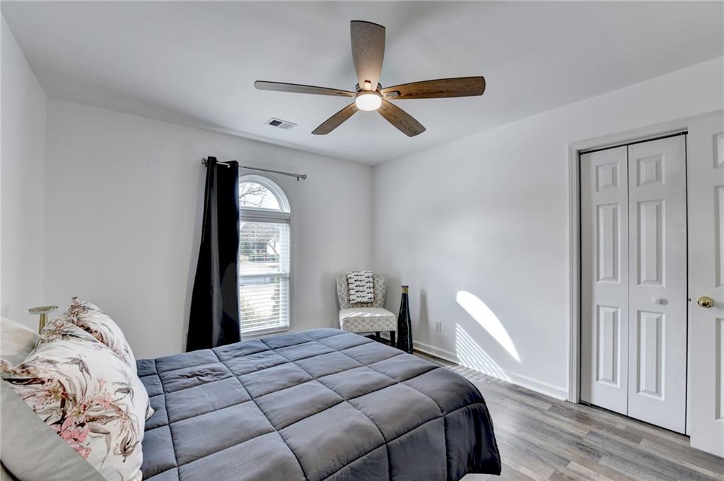 6435 Dressage Crossing Cumming, GA 30040 - Photo 23 of 35 a bedroom with a bed and a window