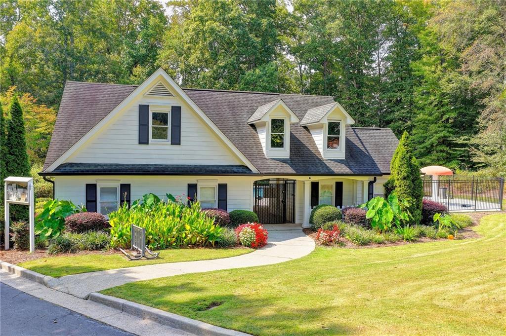 6435 Dressage Crossing Cumming, GA 30040 - Photo 33 of 35 a front view of a house with a yard