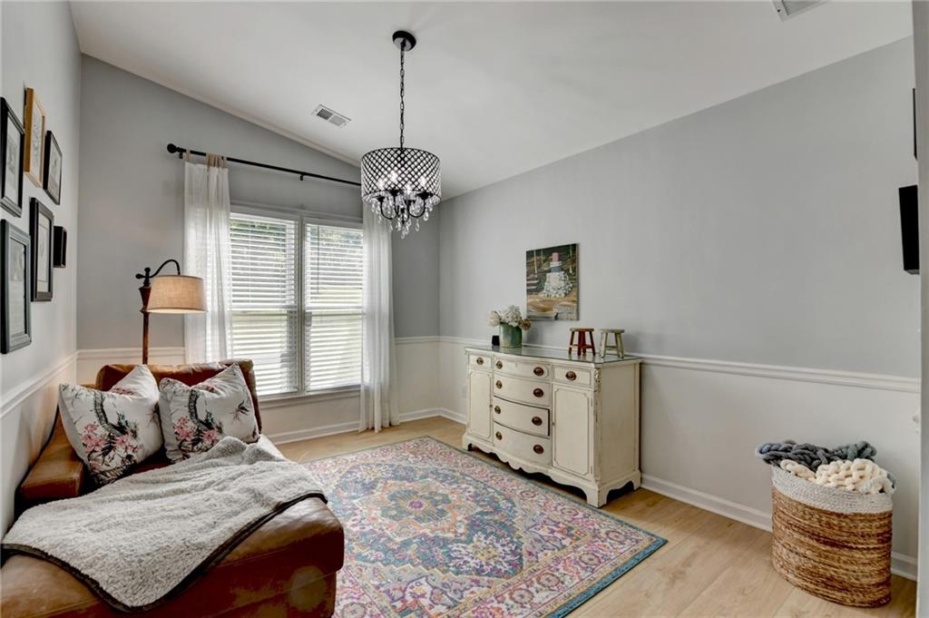 6435 Dressage Crossing Cumming, GA 30040 - Photo 6 of 35 a bedroom with bed and window